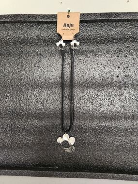 Anju Silver Flower Pendant Necklace in Black